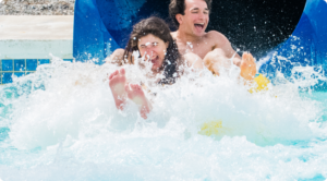 Two people in a water slide
